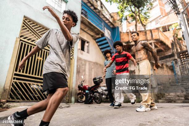 breakdancers dancing outdoors - funk music stock pictures, royalty-free photos & images