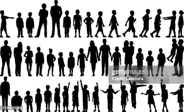 children and family silhouette - girls holding hands stock illustrations