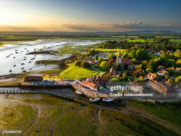 aerial view of bosham village and harbour in west sussex, england - chichester stock pictures, royalty-free photos & images