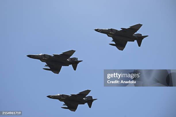 Teams from the 111th, 126th and 193rd squadrons of the Turkish Air Forces perform a demonstration flight over the Istanbul Air Force Museum with...