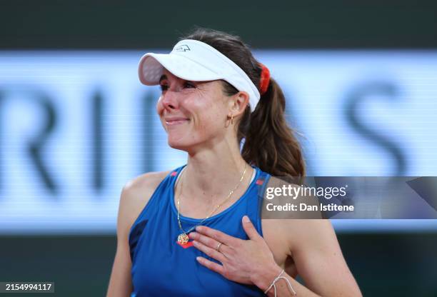 Alize Cornet of France reacts after her loss against Zheng Qinwen of People's Republic of China, and the last tournament of her professional career,...