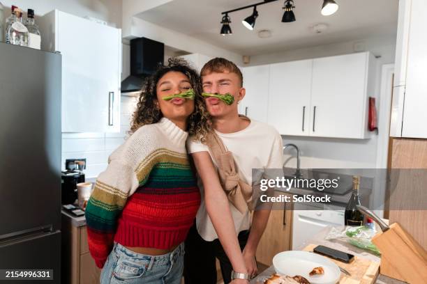 silly faces while cooking - pulling funny faces stock pictures, royalty-free photos & images