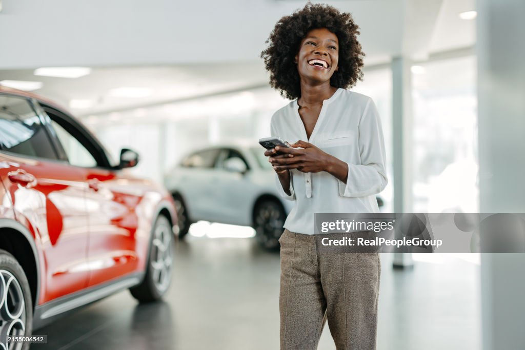 Happy woman with a smartphone