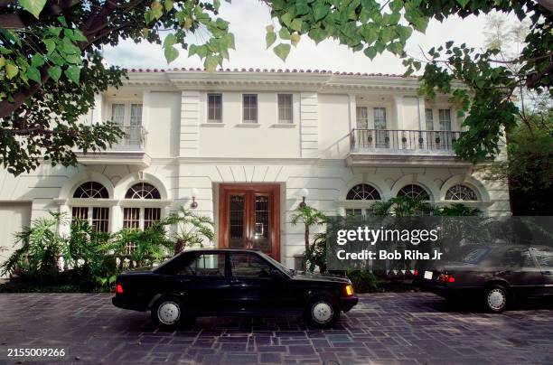 View of million-dollar home, with new owners cars in driveway was formally owned by José and Mary Louise Menendez, who were killed by their two sons,...