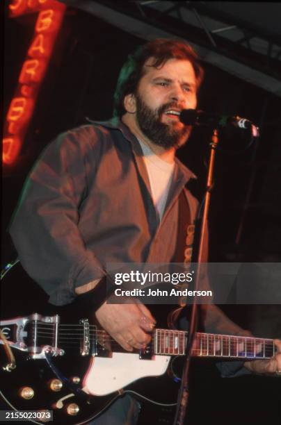 American Country & Rock musician Steve Earle plays guitar as he performs during the South by Southwest music festival, onstage at Stubb's, Austin,...
