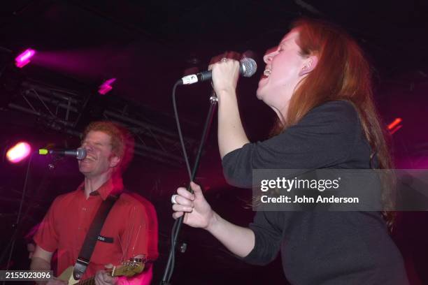 Canadian Rock musicians Carl Newman , on guitar, and vocalist Neko Case, both of group the New Pornographers, perform during the South by Southwest...