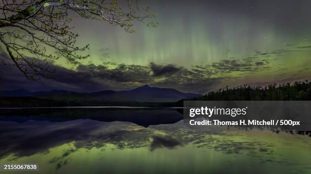 scenic view of lake against sky at night,united states,usa - tamworth village stock-fotos und bilder