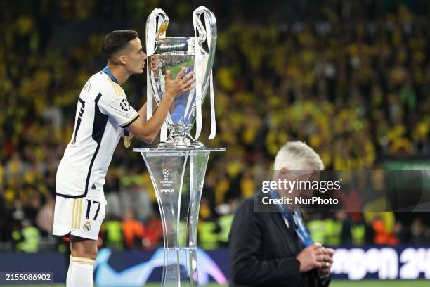 Lucas Vazquez of Real Madrid is celebrating with the trophy after the UEFA Champions League Final match between Real Madrid and Borussia Dortmund at...