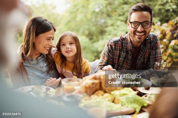 happy family enjoying in lunch outdoors. - garden foods stock pictures, royalty-free photos & images