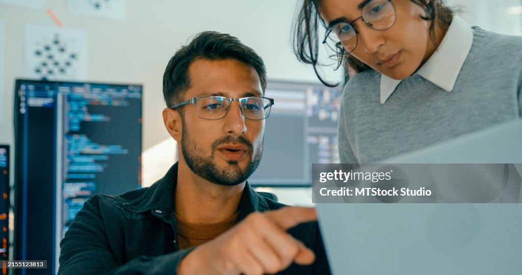 Closeup Of Software Engineering Team Engaged In Problemsolving And Code ...