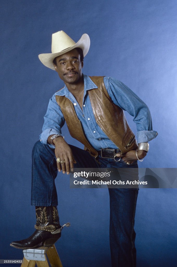 Turman American actor Glynn Turman, wearing a brown leather waistcoat over a ...