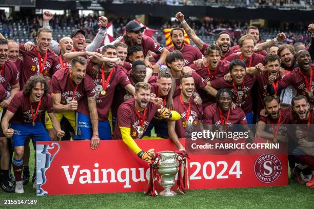 Servette's players pose with the trophy after winning the men's Swiss Cup football final match between Servette FC and FC Lugano at the Wankdorf...