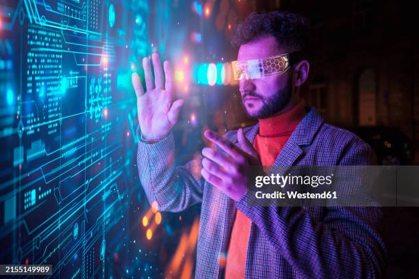engineer gesturing with smart glasses and examining big data - man vr headset stock illustrations