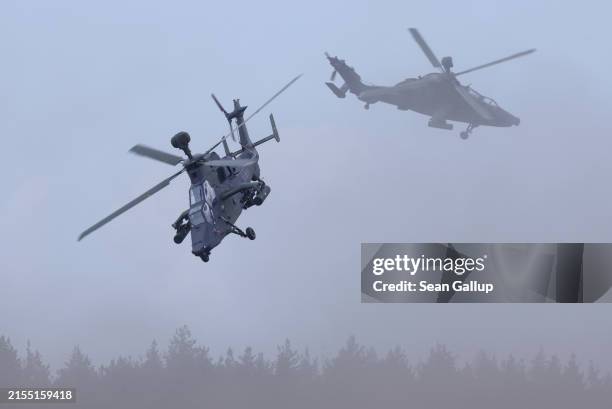 Eurocopter Tiger attack helicopters of the Bundeswehr, the German armed forces, participate in the Quadriga military exercises involving German,...