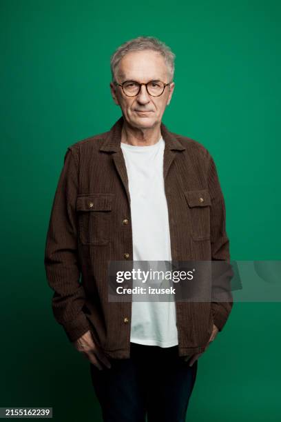 portrait of confident senior man - white jacket stock pictures, royalty-free photos & images