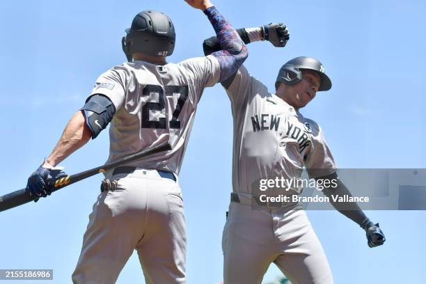 Juan Soto of the New York Yankees celebrates with Giancarlo Stanton after hitting a home run in the first inning at Oracle Park on June 2, 2024 in...
