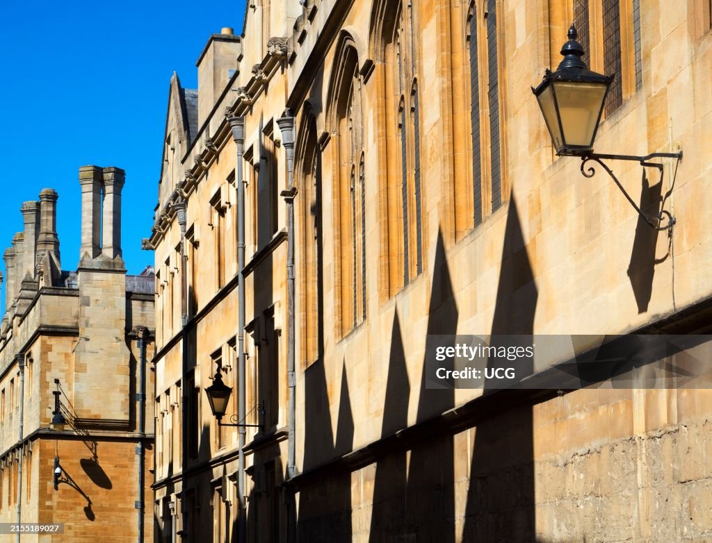 Marching shadows in Brasenose Lane, Oxford, England
