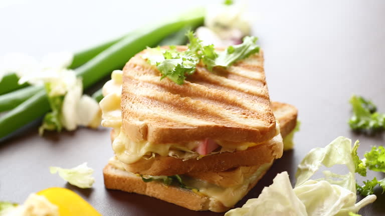 https://media.gettyimages.com/id/2155192135/video/fried-toasts-with-filling-salad-leaves-tomatoes.jpg?b=1&s=640x640&k=20&c=WgZqUl2IZ9BibddaMAJ__BSqjinUPWRWHtW_iUcvD-k=