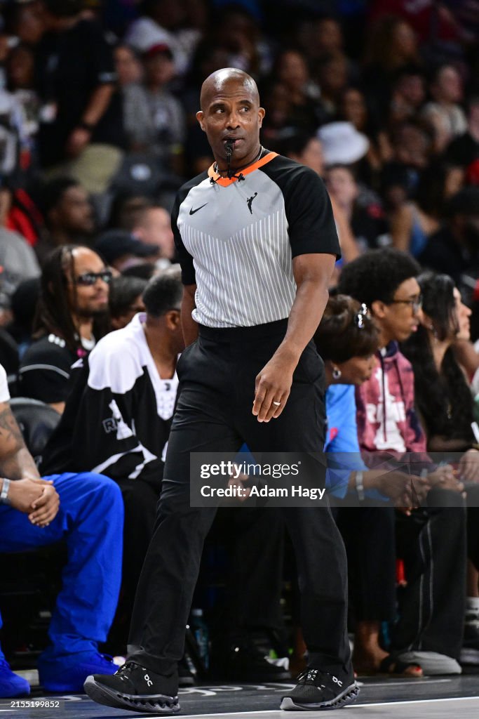 Referee Eric Brewton looks on during the game between the Connecticut ...