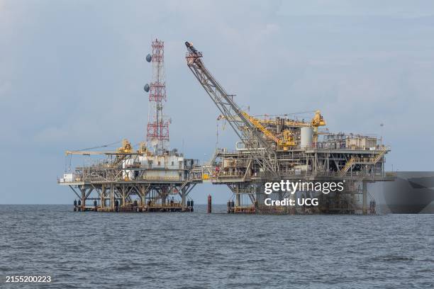 Exxon Mobil offshore platforms near the coastline off Dauphin Island, Alabama.