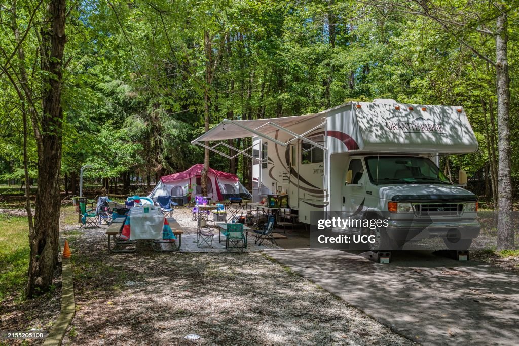 Motorhome and tent at campsite in Fall Creek Falls State Park near Spencer, Tennessee