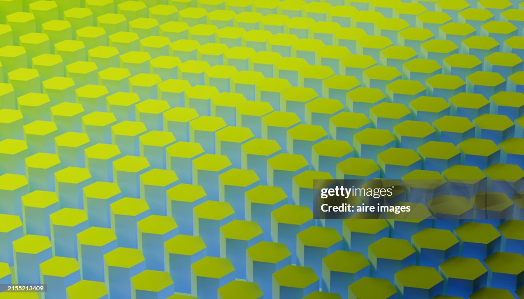 Hexagonal cube textures with green background in a three-dimensional rendered image with light effects, side view