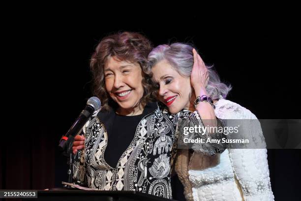 Lily Tomlin and Jane Fonda speak on stage during Era Coalition Forward Women's Equality Trailblazer Awards and premiere of "Still Working 9 to 5" at...