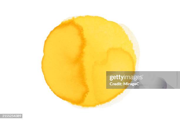 round yellow watercolor spot isolated on white background - watercolor painting stock pictures, royalty-free photos & images