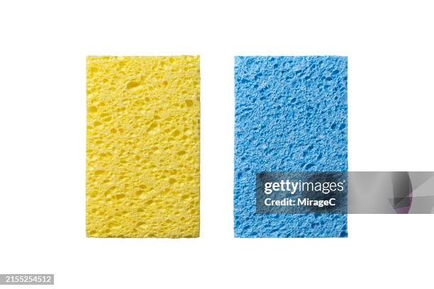 yellow and blue cleaning sponges isolated on white - cleaning sponge stock pictures, royalty-free photos & images