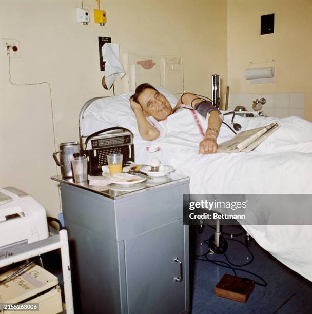 Louis Washkansky smiling from his hospital bed after undergoing the world's first heart transplant operation in Cape Town, South Africa, December...
