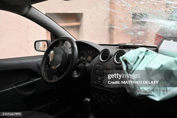 Car s steering wheel airbag and passenger airbag are triggered on a street in Villeurbanne, France, on April 24, 2024.