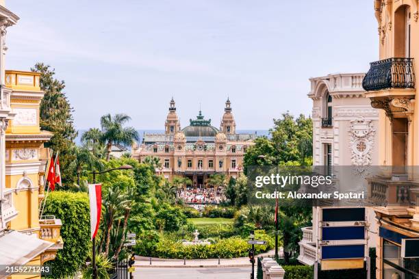 grand casino and monte carlo townscape on a sunny summer day, monaco - monaco stock pictures, royalty-free photos & images
