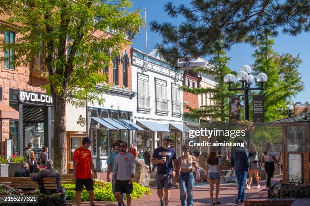 people walking in downtown boulder - main street stores stock pictures, royalty-free photos & images