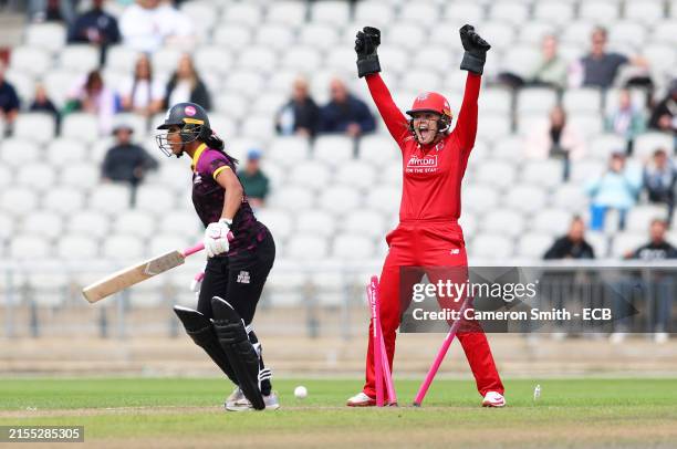 Ellie Threlkeld of Lancashire Thunder celebrates bowling out Davina Perrin of Central Sparks during the Charlotte Edwards Cup between Lancashire...