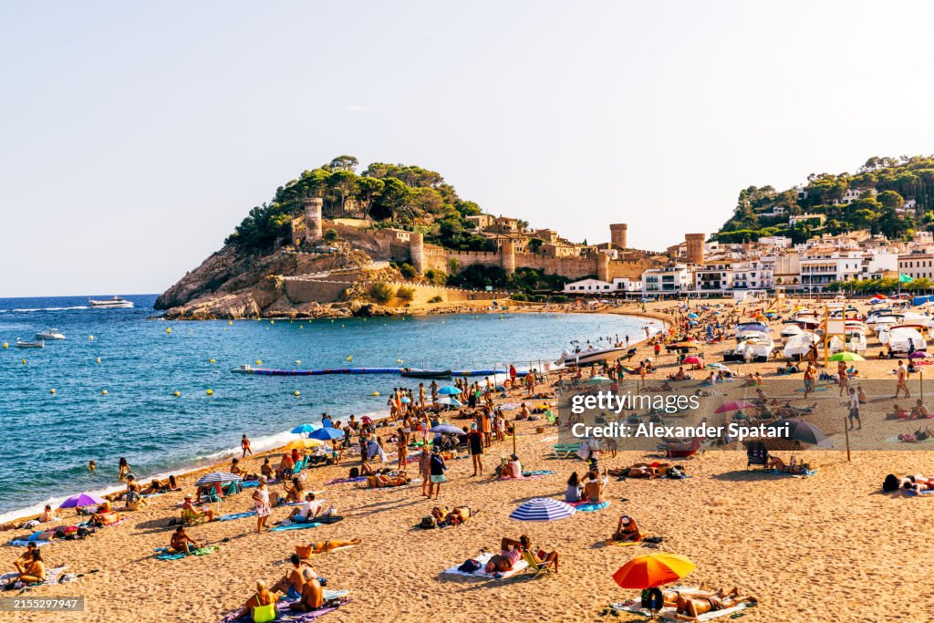 Tossa de Mar beach on a sunny day, aerial view, Costa Brava, Spain
