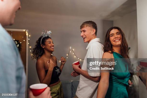 christmas at the uni dorm - college house party dancing stock pictures, royalty-free photos & images