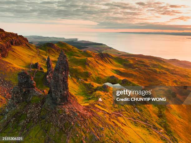 drone view over old man of storr, isle of skye, scotland - dramatic landscape stock pictures, royalty-free photos & images