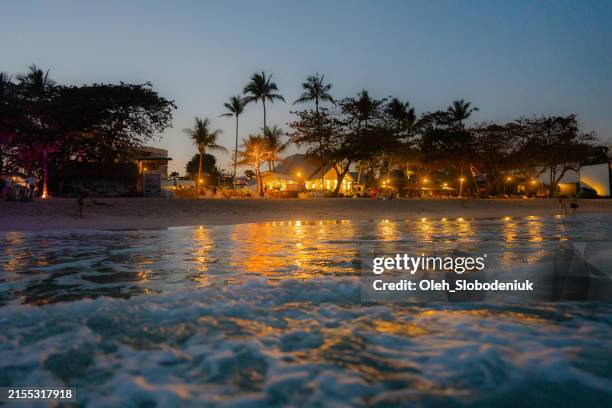 idyllic beach resort on krabi, thailand at night - railay beach stock pictures, royalty-free photos & images