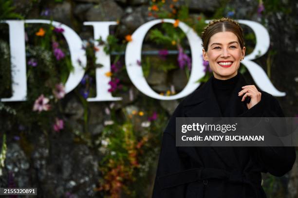 British actress Rosamund Pike poses during a photocall prior to the 2025 Dior Croisiere fashion show on June 3, 2024 at Drummond Castle, in Crieff,...