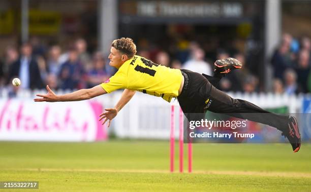 David Payne of Gloucestershire dives in vain for the attempted catch of Daniel Sams of Essex Eagles during the T20 Vitality Blast match between...