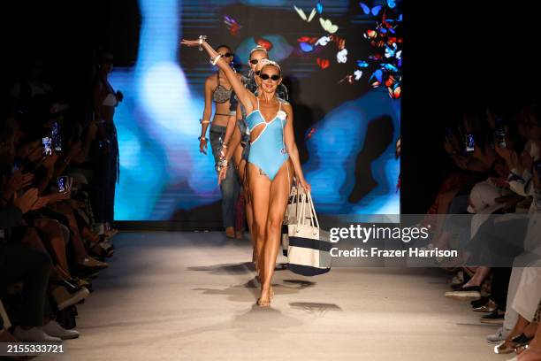 Model walks the runway for St. Thomas University Fashion show during Paraiso Miami Swim Week at The Paraiso Tent on May 30, 2024 in Miami Beach,...