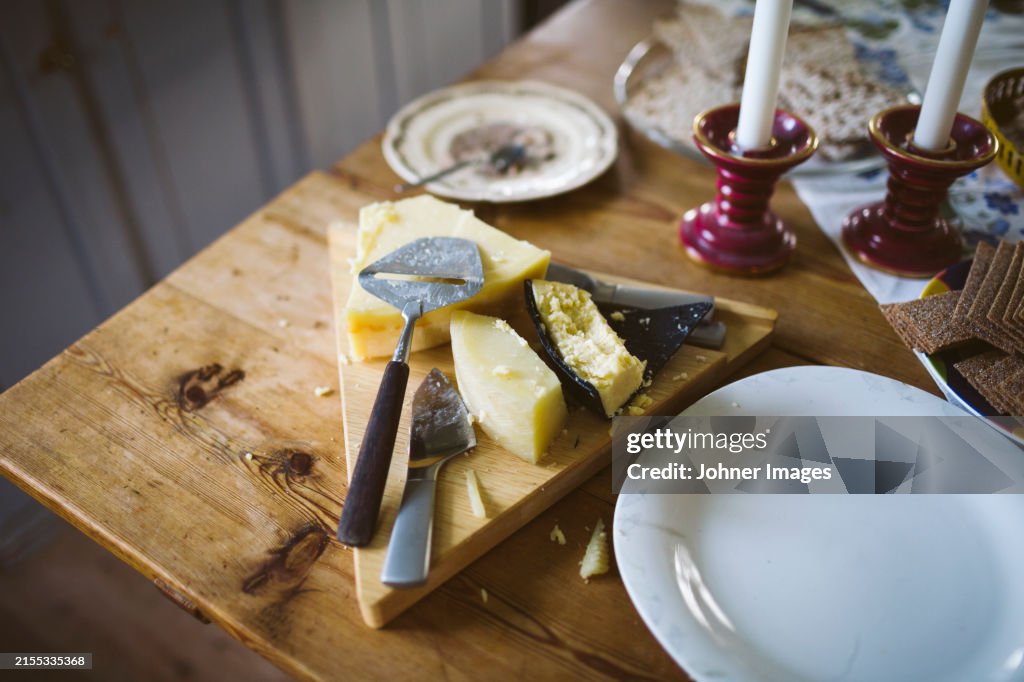 High angle view of cheeseboard on table