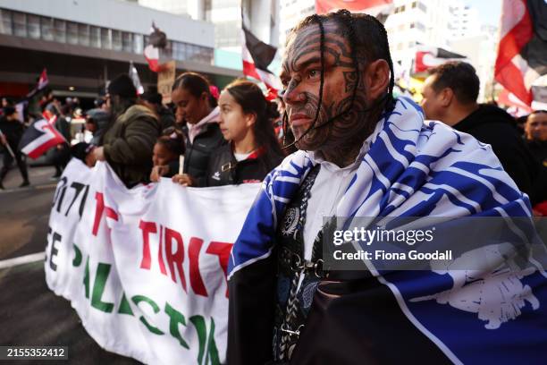 Black Power gang members wearing insignia join a march down Queen St on May 30, 2024 in Auckland, New Zealand. The nationwide day of activation saw...