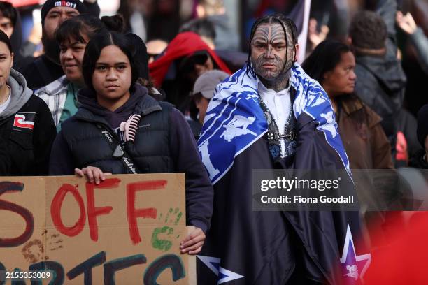 Black Power gang members wearing insignia join a march down Queen St on May 30, 2024 in Auckland, New Zealand. The nationwide day of activation saw...