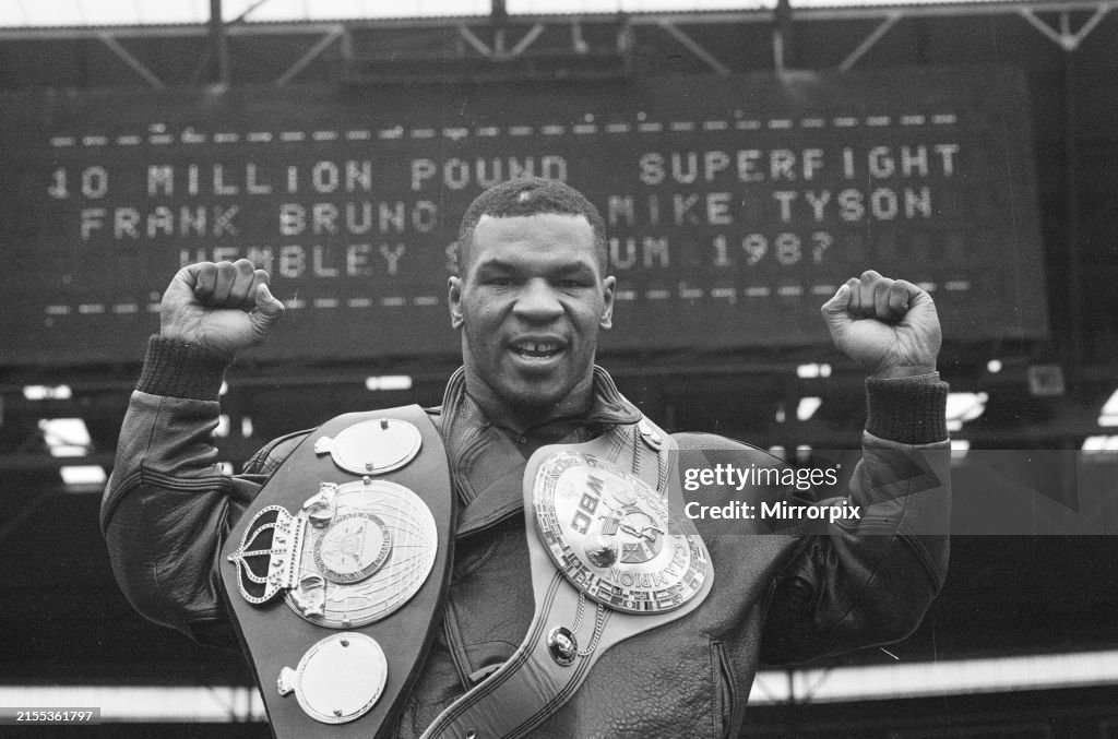 Mike Tyson Poses With Belts At Wembley Stadium, 1987
