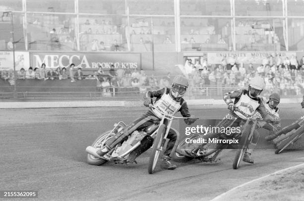 Malcolm Simmonds leads Phil Crump in the first heat at Wimbledon tonight. Simmonds went on the win the heat. Picture taken 12th July 1979. Speedway....