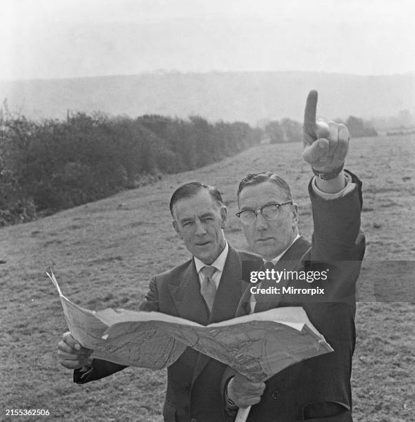 Weston-super-Mare borough engineer, Mr F R Freer - Hewish outlines the area which will soon be covered with new factories. With him is Weston's town...