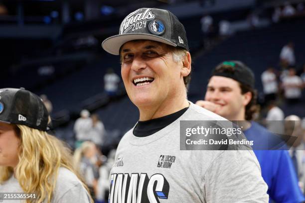 Dallas Mavericks owner Mark Cuban celebrates after a 124-103 victory against the Minnesota Timberwolves in Game Five of the Western Conference Finals...