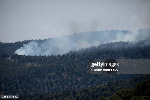 Smoke rises after a fire broke out as a result of a drone attack near the border with Lebanon on June 4, 2024 in Northern Israel, Israel. A series of...