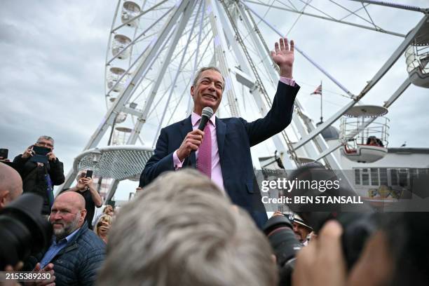 Newly appointed leader of Britain's right-wing populist party, Reform UK, and the party's parliamentary candidate for Clacton, Nigel Farage,...